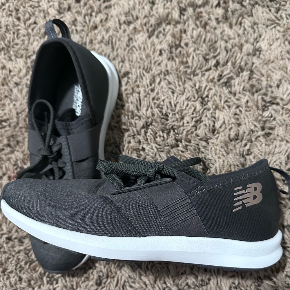 Youth gray new balance shoes